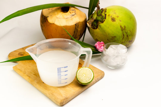 Coconut juice,Drink coconut water on white background