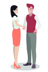 Fototapeta premium A young white guy stands and shakes hands with a girl. Ideal for advertising and presentation.
