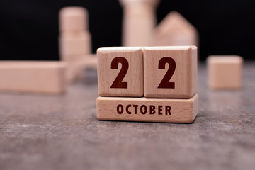 October 22 written with wooden blocks