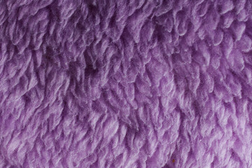 Texture of purple fabric with villi