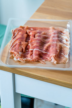 Italian Ham Prosciutto Crudo Or Jamon Sausage In Plastic Box Package / Container For Sale.