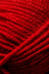 Red skein of thread for knitting. macro