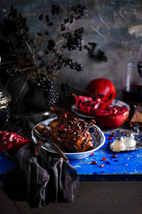 quail in pomegranate sauce. rustic photo