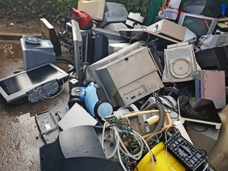 Pile of used electronic and housewares waste