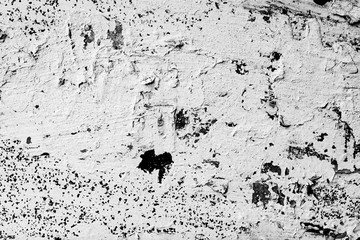 Texture of a concrete wall with cracks and scratches which can be used as a background