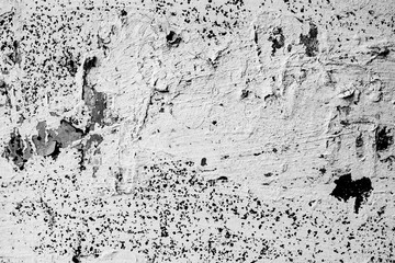 Texture of a concrete wall with cracks and scratches which can be used as a background