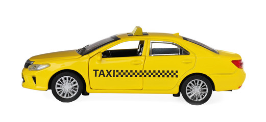 Fototapeta na wymiar Yellow taxi car model isolated on white