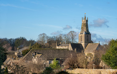 View of the ancient market town of Minchinhampton near to Stroud in The Cotswolds. Including the parish church of The Holy Trinity. Gloucestershire, Cotswolds, England, United Kingdom. © John Corry