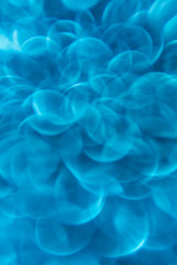 Aqua blue abstract background. Texture bokeh. Defocused image