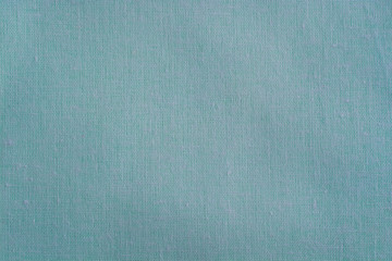Turquoise fabric close-up. Background for designers.