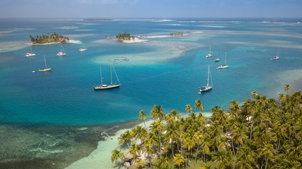 San Blas Islands, Panama - The Sailing Paradise! A beautiful Drone Shot of many Sailboats anchored...