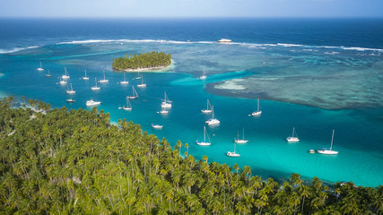San Blas Islands, Panama - The Sailing Paradise! Aerial Drone Shot of many Sailboats anchored in...