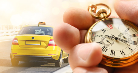 Taxi service concept. Yellow taxi car drive on the road and hand with pocket watch.