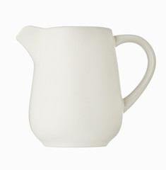 Porcelain milk jug isolated on white background. Close up.