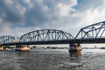 Krung Thon Bridge is a bridge over the Chao Phraya River. It has 6 spans, and consists of a steel superstructure resting on concrete piers.