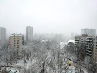 Moscow, Russia - January 11, 2020: View to residential area during snowfall
