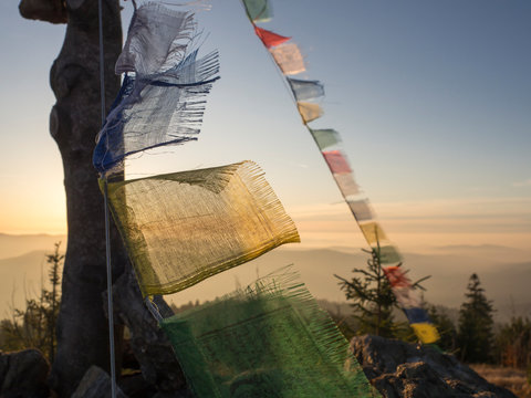 Germany, Bavaria, Prayer flags on mountaintop of Heugstatt