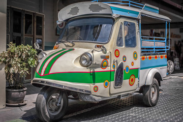 Photo of typical Tuk Tuk taxi in the street of Hua Hin. 2015 February Thailand Hua Hin.