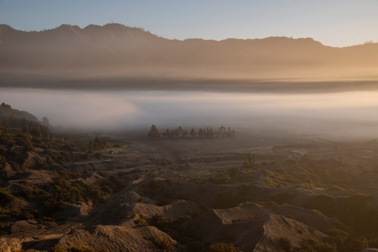 Indonesia, East Java, Thick morning fog shrouding valley in?Bromo Tengger Semeru National Park