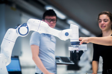 Sudents studying robotic at an university institute