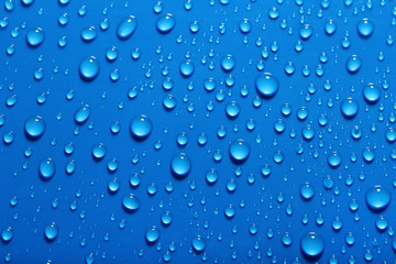 Water drops on blue background