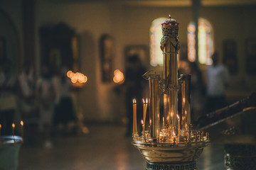 Church ordinance orthodox and wedding, church wedding, religious of a child in church, icons, Orthodox church, candles, interior of the Orthodox Church, bible, font - obrazy, fototapety, plakaty