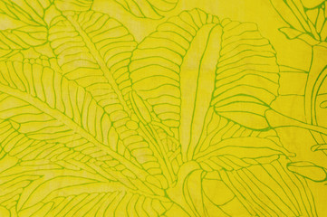 Background. Texture. Pattern. Yellow leaves pattern. Cotton fabric. Calico Abstraction.