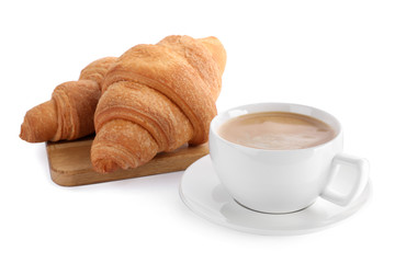 Fresh croissants and coffee on white background