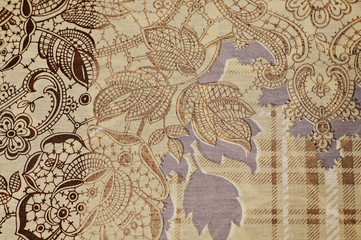 Background. Texture. Pattern. Brown pattern. Leaves. Cotton fabric. Calico Abstraction.