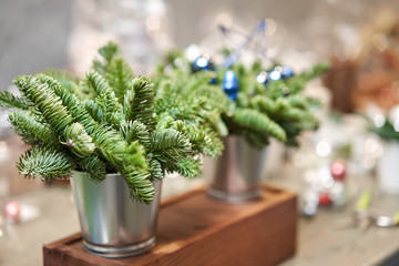 Closeup Christmas arrangement. Master class on making decorative ornaments. Christmas decor with their own hands. The new year celebration. Flower shop