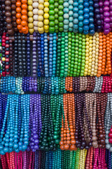 Many colorful wooden jewelry with balls