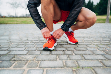 Senior retired man runs and performs exercise