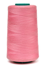 Spool of pink sewing threads isolated on white background