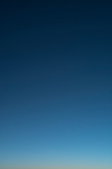 blue sky background. clouds horizon. View from the airplane window. DARK BLUE CLOUDS BACKGROUND, NATURE BLUE SKIES. Atmosphere of Earth Sky Blue Daytime, Dark blue background transparent