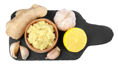 Fresh garlic and other natural cold remedies isolated on white, top view