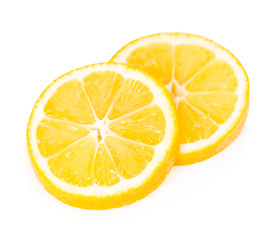 Lemon slices isolated on white background.