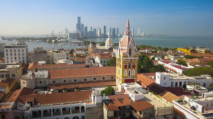 Fototapeta na wymiar Cartagena Colombia Old Town - Aerial Drone View of the famous Cathedral of Santa Catalina de Alejandria in the Historical City Center of Cartagena de Indias with the Skyscraper Skyline of Bocagrande.