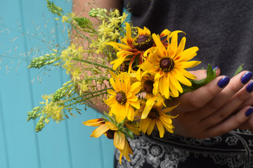 a handful of bright yellow flowers