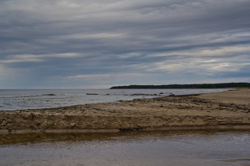 Landscape in cloudy weather at sea