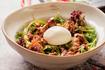 Leaf salad with poached egg and red meat. Dinner Idea. A healthy, delicious brunch.