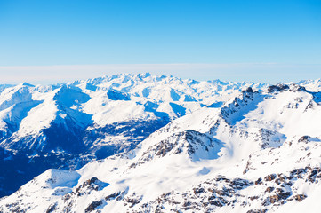 Beautiful mountains and the blue sky, winter landscape. Val Thorens, 3 Valleys, France.