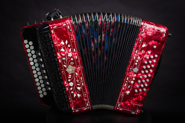 Russian folk musical instruments. Accordion, spoons, Psalms