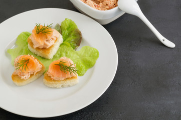 pate of smoked salmon on bread in the shape of a heart.