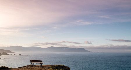 Fototapeta na wymiar The most beautiful bench in the world, Loiba cliffs, Ortigueira, Galicia, Spain