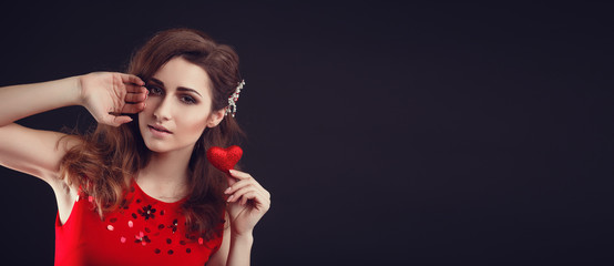 Beautiful arab or latin american woman in red dress