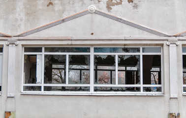 Acts of vandalism, broken windows in an abandoned building