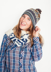 young pretty blond woman in hat and winter scarf smiling cheerful on white background, lifestyle people concept