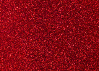 Bright trendy red background with glitter.