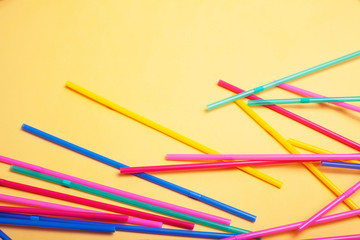 summer stuff on yellow background close up top view