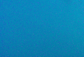 Bright trendy light blue background with glitter.